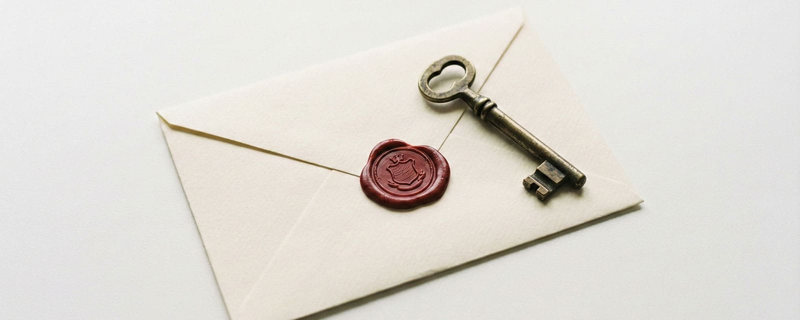 Minimalist security concept with envelope and key