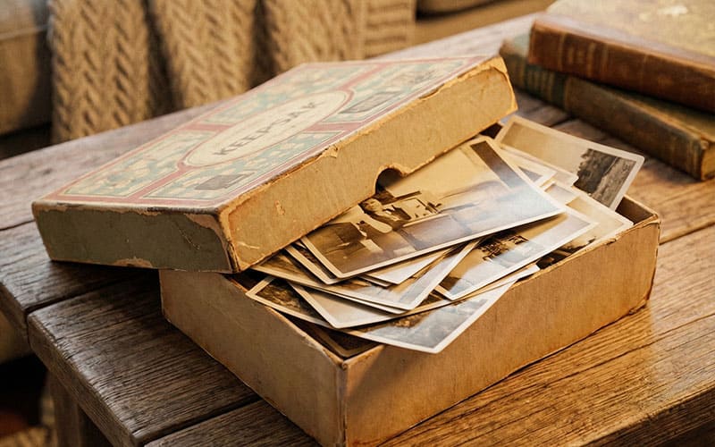 Open keepsake box with vintage photos